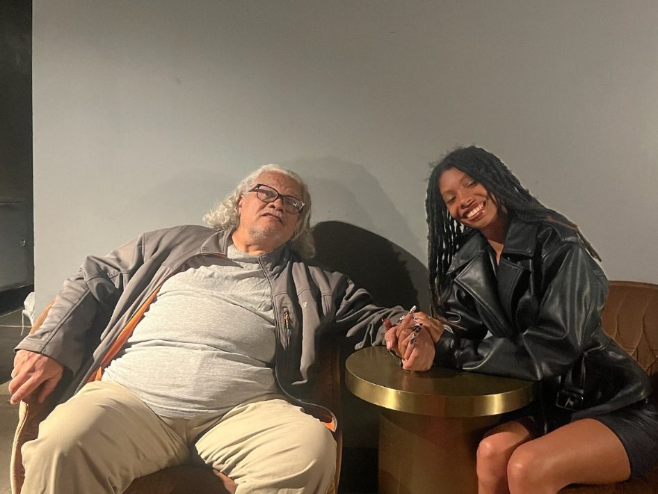 Sidney Strickland with his granddaughter Michael